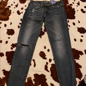Women's Distressed Blue Jeans